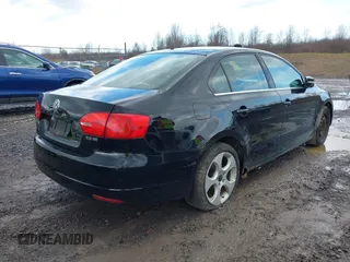 2013 Volkswagen Jetta SE with VIN 3VWDP7AJ4DM352849, listed as a IAAI auction lot 41918821 with 143,547 mi miles and . Bid and sale history available at DreamBid. Image 4.