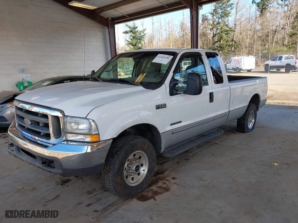 2000 Ford Super Duty F-250 XL with VIN 1FTNX21F4YEC30722, listed as a IAAI auction lot 41409384 with 310,516 mi miles. Bid and sale history available at carsss.com. Image 17.