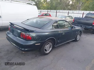 1998 Ford Mustang z VIN 1FAFP4041WF161422, wystawiony jako IAAI lot #42495413 z przebiegiem 207 906 mil mil oraz . Historia ofert i sprzedaży dostępna na DreamBid. Obrazek 4.