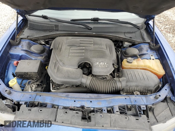 2012 Dodge Charger SXT with VIN 2C3CDXHG2CH244247, listed as a Copart auction lot 48321705 with 144,488 mi miles and Salvage Title. Bid and sale history available at DreamBid. Image 11.