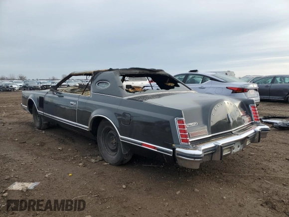 1977 Lincoln Continental with VIN 7Y89A809603, listed as a Copart auction lot 85104154 with Not Provided miles and Salvage Title. Bid and sale history available at DreamBid. Image 2.