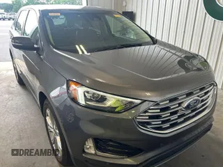 2021 Ford Edge Titanium z VIN 2FMPK3K97MBA51131, wystawiony jako IAAI lot #42529673 z przebiegiem 92 302 mil mil oraz . Historia ofert i sprzedaży dostępna na DreamBid. Obrazek 7.