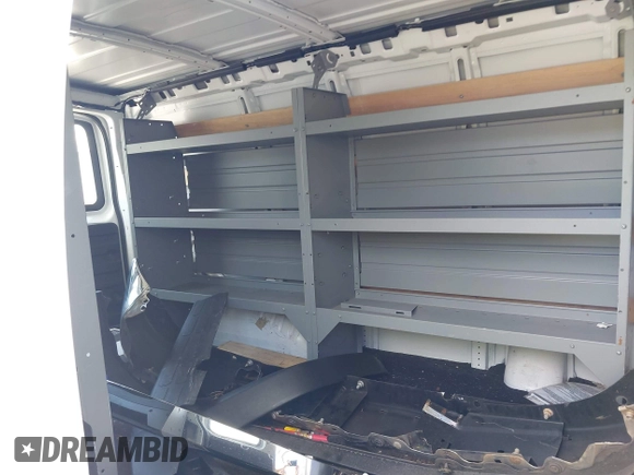 2021 Chevrolet Express Cargo z VIN 1GCWGAF71M1207030, wystawiony jako IAAI lot #42824104 z przebiegiem 40 809 mil mil oraz . Historia ofert i sprzedaży dostępna na DreamBid. Obrazek 8.