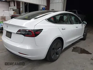 2020 Tesla Model 3 Standard Range Plus with VIN 5YJ3E1EA7LF805828, listed as a IAAI auction lot 41841505 with 44,946 mi miles and . Bid and sale history available at DreamBid. Image 4.