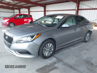 2016 Hyundai Sonata Hybrid SE with VIN KMHE24L19GA041755, listed as a IAAI auction lot 41836917 with 109,863 mi miles. Bid and sale history available at carsss.com. Image 2.