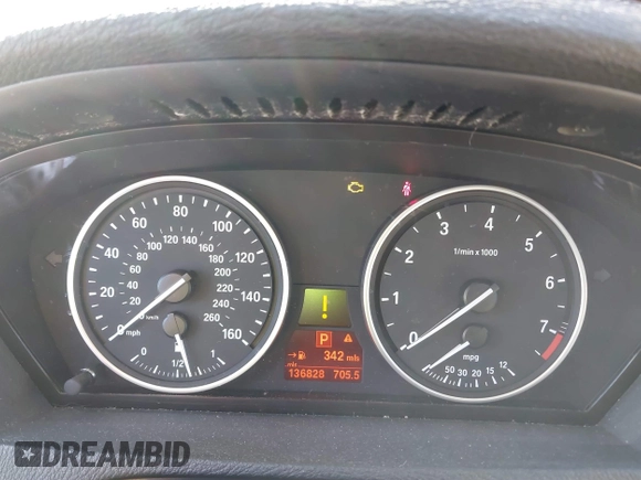 2011 BMW X5 35i with VIN 5UXZV4C52BL413125, listed as a IAAI auction lot 41697824 with 136,828 mi miles. Bid and sale history available at carsss.com. Image 7.