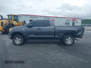 2012 Toyota Tundra z VIN 5TFUW5F10CX265994, wystawiony jako IAAI lot #42172968 z przebiegiem 197 493 mil mil oraz . Historia ofert i sprzedaży dostępna na DreamBid. Obrazek 14.