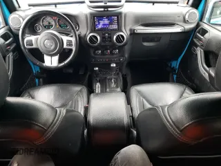 2017 Jeep Wrangler Unlimited Sahara with VIN 1C4BJWEG3HL631057, listed as a Copart auction lot 48070355 with 88,477 mi miles and Salvage title. Bid and sale history available at DreamBid. Image 8.