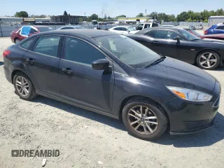 2018 Ford Focus SE with VIN 1FADP3FE8JL205699, listed as a Copart auction lot 63300795 with 128,877 mi miles and Clean title. Bid and sale history available at DreamBid. Image 4.