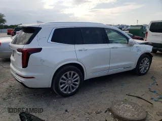 2023 Cadillac XT6 FWD Premium Luxury with VIN 1GYKPCRS5PZ120161, listed as a Copart auction lot 54614235 with 39,700 mi miles and Salvage title. Bid and sale history available at DreamBid. Image 3.