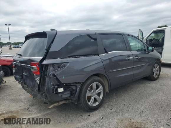 2019 Honda Odyssey EX with VIN 5FNRL6H50KB028595, listed as a Copart auction lot 65846434 with 77,596 mi miles and Salvage title. Bid and sale history available at DreamBid. Image 3.