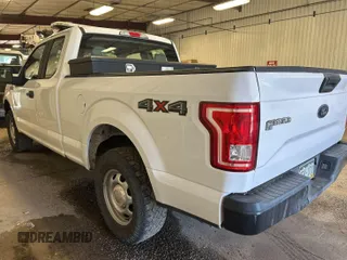 2017 Ford F-150 XL with VIN 1FTEX1E82HKD27618, listed as a IAAI auction lot 42796140 with 124,457 mi miles and . Bid and sale history available at DreamBid. Image 3.