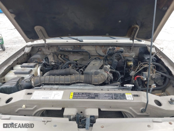 2003 Ford Ranger XL with VIN 1FTYR10U73PB00559, listed as a IAAI auction lot 41203236 with 192,029 mi miles. Bid and sale history available at carsss.com. Image 10.