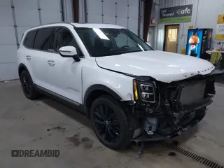 2020 Kia Telluride SX z VIN 5XYP5DHC0LG028692, wystawiony jako IAAI lot #42263679 z przebiegiem 67 857 mil mil oraz . Historia ofert i sprzedaży dostępna na DreamBid. Obrazek 1.