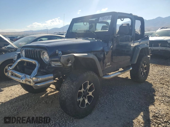 2005 Jeep Wrangler SE with VIN 1J4FA29S65P330905, listed as a Copart auction lot 71633134 with 77,598 mi miles and Salvage Title. Bid and sale history available at carsss.com. Image 1.