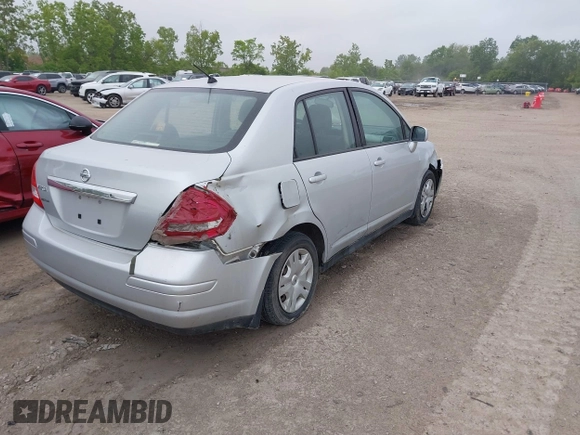 2010 Nissan Versa S with VIN 3N1BC1AP9AL404584, listed as a IAAI auction lot 42367293 with 158,377 mi miles and . Bid and sale history available at DreamBid. Image 4.