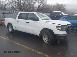 2023 Ram 1500 Tradesman with VIN 1C6RRFGG9PN546464, listed as a IAAI auction lot 41230048 with 27,727 mi miles and . Bid and sale history available at DreamBid. Image 1.
