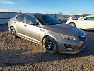 2015 Kia Optima LX z VIN 5XXGM4A74FG446312, wystawiony jako IAAI lot #41030302 z przebiegiem 119 556 mil mil oraz . Historia ofert i sprzedaży dostępna na DreamBid. Obrazek 1.
