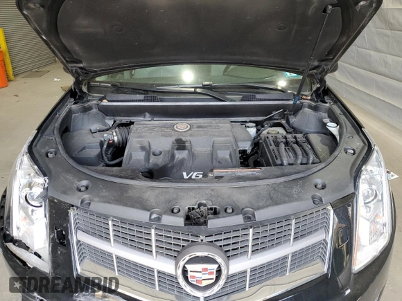 2012 Cadillac SRX Performance Collection with VIN 3GYFNEE3XCS593868, listed as a Copart auction lot 54381275 with 80,855 mi miles and Salvage title. Bid and sale history available at DreamBid. Image 12.