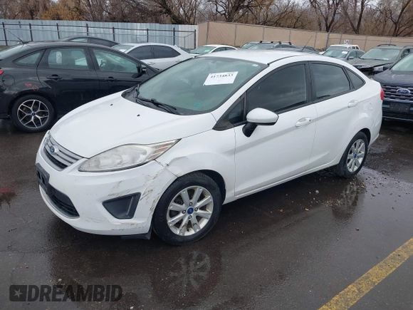 2012 Ford Fiesta SE with VIN 3FADP4BJ8CM102695, listed as a IAAI auction lot 41734833 with 131,779 mi miles. Bid and sale history available at carsss.com. Image 2.