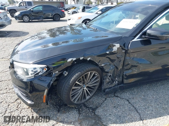 2018 BMW 5 Series 530i with VIN WBAJA5C56JG897692, listed as a IAAI auction lot 41813052 with 37,610 mi miles and . Bid and sale history available at DreamBid. Image 6.