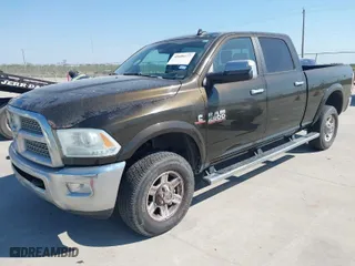 2013 Ram 2500 Laramie with VIN 3C6UR5FL7DG529590, listed as a IAAI auction lot 40608177 with 141,594 mi miles. Bid and sale history available at carsss.com. Image 2.