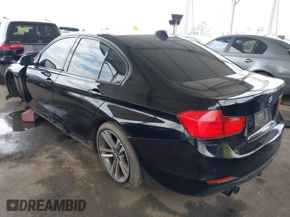 2014 BMW 3 Series 328i with VIN WBA3C1G53ENR49917, listed as a IAAI auction lot 42116704 with 148,630 mi miles and . Bid and sale history available at carsss.com. Image 3.