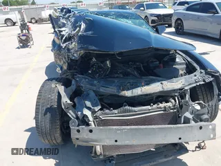 2014 Chevrolet Camaro LS z VIN 2G1FA1E32E9126043, wystawiony jako IAAI lot #42253189 z przebiegiem 104 457 mil mil oraz . Historia ofert i sprzedaży dostępna na DreamBid. Obrazek 17.