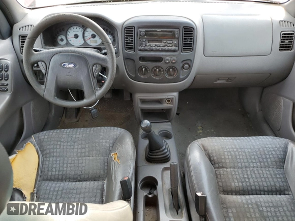 2002 Ford Escape XLS Value with VIN 1FMYU01B82KC15443, listed as a Copart auction lot 77998164 with 212,313 mi miles and Salvage title. Bid and sale history available at DreamBid. Image 8.