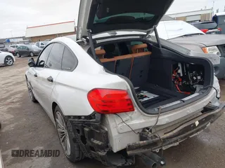 2016 BMW 4 Series 428i with VIN WBA4A9C5XGG506931, listed as a IAAI auction lot 41539868 with 91,292 mi miles. Bid and sale history available at carsss.com. Image 3.