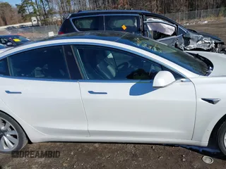 2020 Tesla Model 3 Long Range with VIN 5YJ3E1EB1LF621185, listed as a IAAI auction lot 41375686 with 92,044 mi miles. Bid and sale history available at carsss.com. Image 14.