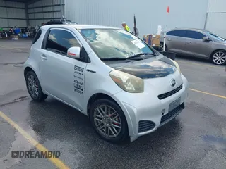 2013 Scion iQ with VIN JTNJJXB00DJ023345, listed as a IAAI auction lot 42631440 with 73,105 mi miles and . Bid and sale history available at DreamBid. Image 1.
