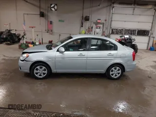 2011 Hyundai Accent GLS z VIN KMHCN4AC1BU605828, wystawiony jako IAAI lot #42129829 z przebiegiem 154 224 mil mil oraz . Historia ofert i sprzedaży dostępna na DreamBid. Obrazek 14.