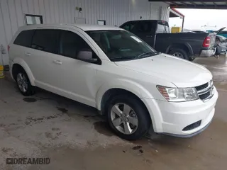 2013 Dodge Journey American Value Pkg with VIN 3C4PDCAB8DT537910, listed as a IAAI auction lot 41320286 with 178,691 mi miles. Bid and sale history available at carsss.com. Image 1.