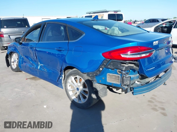 2020 Ford Fusion SE with VIN 3FA6P0H77LR153539, listed as a IAAI auction lot 42054318 with 103,820 mi miles and . Bid and sale history available at DreamBid. Image 3.