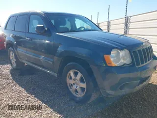 2008 Jeep Grand Cherokee Laredo with VIN 1J8GS48K78C114053, listed as a IAAI auction lot 41851251 with 186,192 mi miles. Bid and sale history available at carsss.com. Image 1.