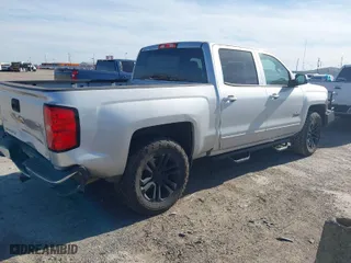 2018 Chevrolet Silverado 1500 LT with VIN 3GCPCREC4JG644935, listed as a IAAI auction lot 41821716 with 80,395 mi miles. Bid and sale history available at carsss.com. Image 4.