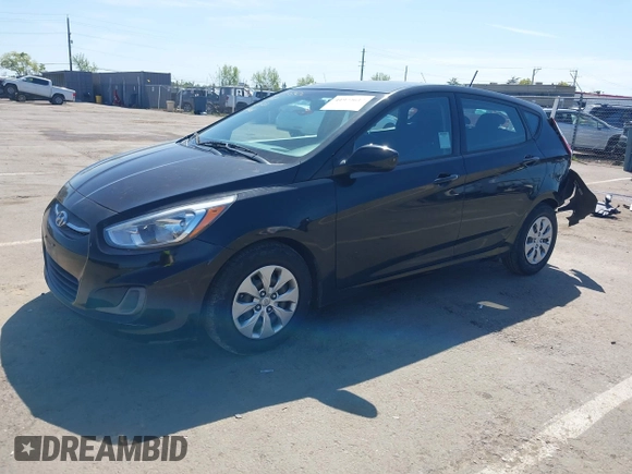 2017 Hyundai Accent SE with VIN KMHCT5AE6HU363642, listed as a IAAI auction lot 41973617 with 128,269 mi miles. Bid and sale history available at carsss.com. Image 2.