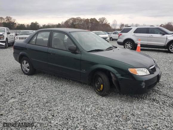 2001 Mazda Protege DX with VIN JM1BJ222010447414, listed as a Copart auction lot 81344584 with 195,931 mi miles and Salvage Title. Bid and sale history available at carsss.com. Image 4.