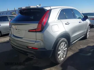 2023 Cadillac XT4 FWD Luxury with VIN 1GYAZAR43PF185264, listed as a IAAI auction lot 40659418 with 11,666 mi miles. Bid and sale history available at carsss.com. Image 4.