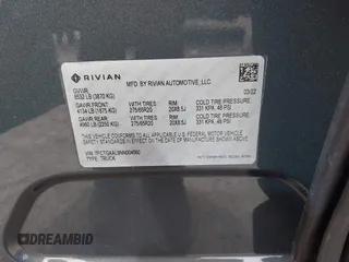 2022 Rivian R1T Launch Edition with VIN 7FCTGAAL9NN004060, listed as a IAAI auction lot 41637884 with 40,268 mi miles. Bid and sale history available at carsss.com. Image 9.