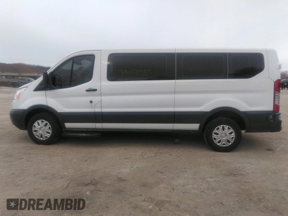 2018 Ford Transit Passenger XL z VIN 1FBZX2ZM6JKA56605, wystawiony jako IAAI lot #39020933 z przebiegiem 89 491 mil mil oraz . Historia ofert i sprzedaży dostępna na DreamBid. Obrazek 14.