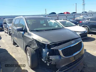 2017 Kia Sedona LX with VIN KNDMB5C14H6329340, listed as a IAAI auction lot 41803814 with 106,672 mi miles. Bid and sale history available at carsss.com. Image 1.
