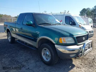 2000 Ford F-150 XL with VIN 1FTRX18L4YNA94311, listed as a IAAI auction lot 41814890 with 1 mi miles. Bid and sale history available at carsss.com. Image 1.