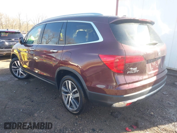 2016 Honda Pilot Touring with VIN 5FNYF6H90GB126572, listed as a IAAI auction lot 41872113 with 94,318 mi miles. Bid and sale history available at carsss.com. Image 3.