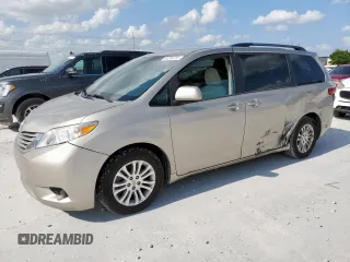 2015 Toyota Sienna LE AAS with VIN 5TDKK3DC4FS552390, listed as a Copart auction lot 64284755 with 105,572 mi miles and Salvage title. Bid and sale history available at DreamBid. Image 1.