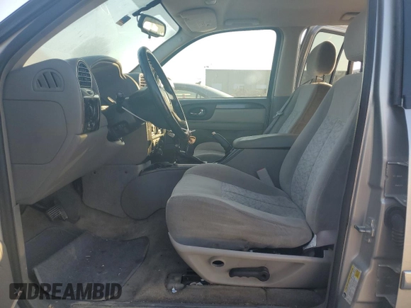 2006 GMC Envoy SLE with VIN 1GKDS13S962219216, listed as a Copart auction lot 71656164 with 328,966 mi miles and Salvage Title. Bid and sale history available at carsss.com. Image 7.