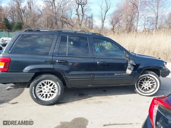 2004 Jeep Grand Cherokee Limited with VIN 1J4GW58N74C120435, listed as a IAAI auction lot 41815094 with 193,056 mi miles. Bid and sale history available at carsss.com. Image 13.