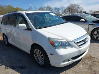 2006 Honda Odyssey Touring z VIN 5FNRL38866B003179, wystawiony jako IAAI lot #41893939 z przebiegiem 192 161 mil mil oraz . Historia ofert i sprzedaży dostępna na DreamBid. Obrazek 1.