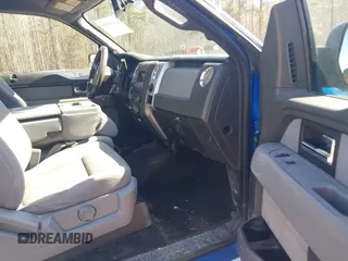 2014 Ford F-150 XL with VIN 1FTFX1EF2EFC25761, listed as a IAAI auction lot 41610999 with 265,989 mi miles. Bid and sale history available at carsss.com. Image 5.